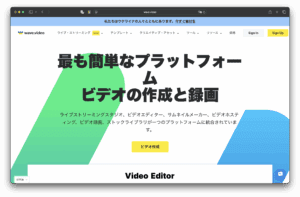 挥手。 日本视频网站将出现，黑字粗体鼓励轻松制作和录制视频，背景中有彩色几何图形，并有一个显眼的黄色按钮写着“视频创作”。